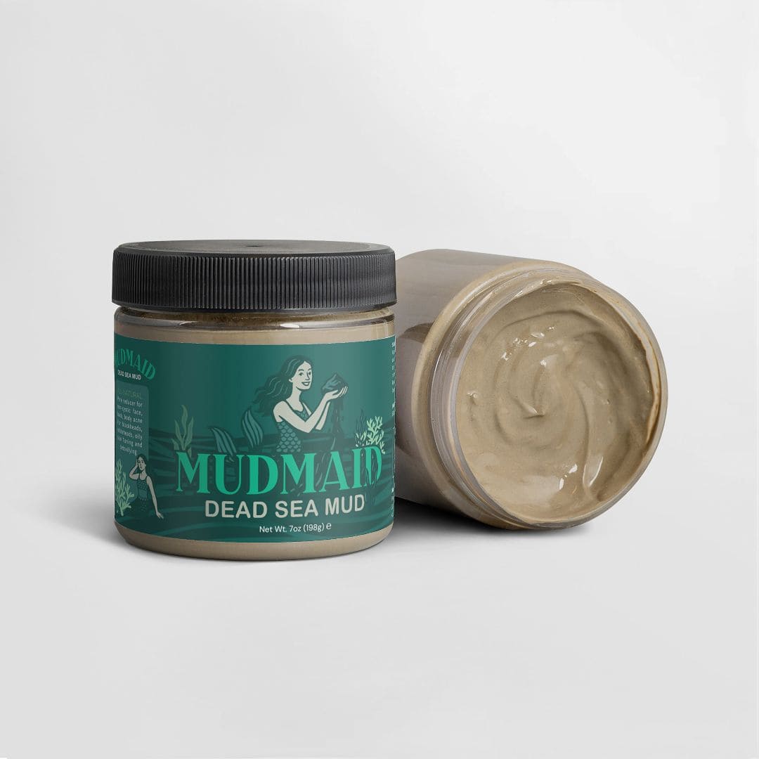 Open Mudmaid Dead Sea Mud Mask jar revealing smooth mineral-rich mud texture beside closed product.